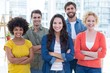 © WavebreakMediaMicro - Group portrait of happy young colleagues