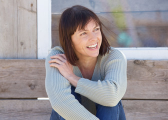 Wall Mural - Natural older lady smiling outside