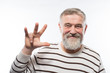 © kostyha - an old man with a beard raised his hand up