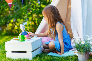 Poster - Girl playing outdoors on summer