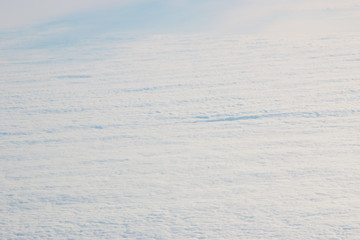 Wall Mural - clouds from an airplane as background