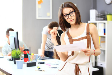 Canvas Print - Image of  successful businesswoman looking at camera at meeting