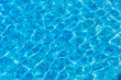 © Elnur - Texture of blue water in the pool