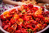 Fototapeta Londyn - Red peppers being sun dried for sale.
