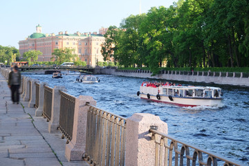 Wall Mural - St. Petersburg, Russia, June, 7, 2015: boat on a Moika river in St. Petersburg