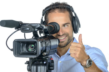 Wall Mural - a young man with professional movie camera