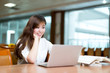 © zhu difeng - Asian beautiful female student study in library with laptop