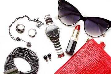 Wall Mural - Overhead fashion female accessories watch sunglasses red purse.