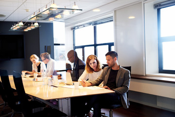 Group of executives working in conference room