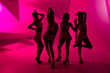 silhouettes of dancing girls