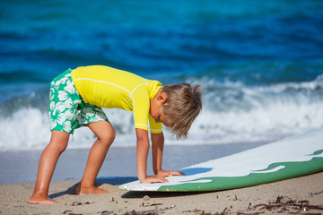 Wall Mural - Boy with surfboard