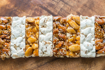 Canvas Print - Turron slices on the wooden board