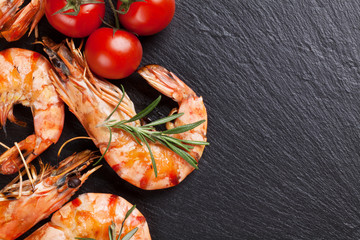 Wall Mural - Grilled shrimps on stone plate