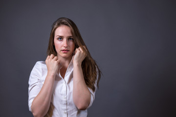 Young Woman Wearing White Button-up Shirt