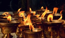 Close-up Of Buddhist Candles