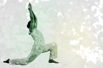 Composite image of content brunette in white doing tai chi