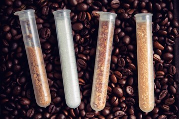 coffee mocha hot and coffee beans on wooden table on brown backg