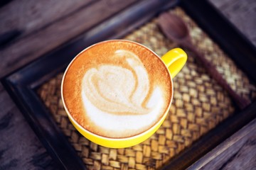 Sticker - coffee mocha hot on wooden table on wooden background