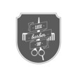 Barber Shop emblem or label depicting a comb and scissors with text, one in a shield and a ribbon banner and wreath, vector illustration on white