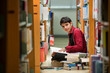 © torwaiphoto - Students Asian men I read the book at the library The bookshelf
