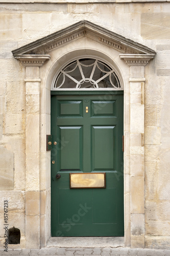 Obraz w ramie Door entrance to town house old antique architectural