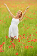 © muro - happy pregnant woman in poppie field