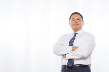 Professional Hispanic Male In Suit With Confident Expression