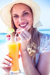 Wall Mural - Beautiful blonde woman on a sunny day