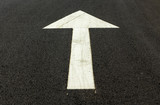 Fototapeta  - Arrow symbol on asphalt road