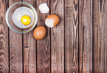 Eggs On A Wooden Background