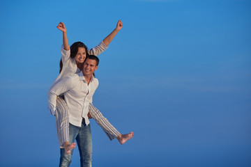 Wall Mural - happy young romantic couple have fun arelax  relax at home