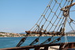© leomalsam - Sails / Sails of a pirate ship on a background of blue sky.