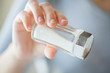 © Syda Productions - close up of hand holding white salt cellar