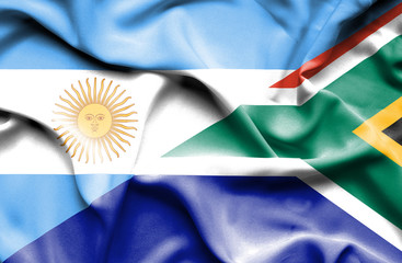 Waving flag of South Africa and Argentina