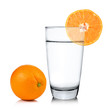 Glass of water with orange fruit