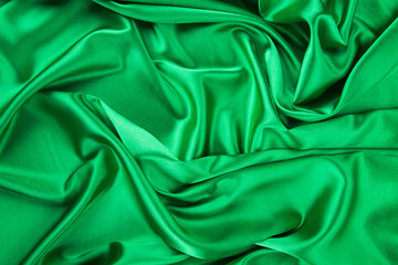 Wall Mural - Green silk cloth with some folds.