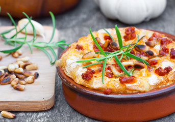 baked camembert with chorizo garlic rosemary fried pine nuts