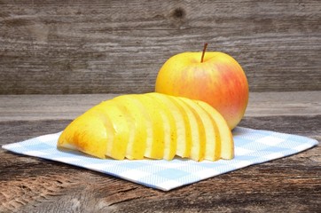 Apple on wooden table