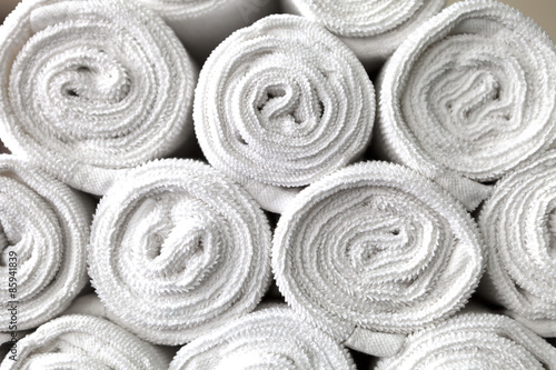 Fotografie, Obraz rolled white body towels, beautiful background