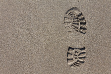 Imprint Of The Hiking Boot On Sand With Copy Space