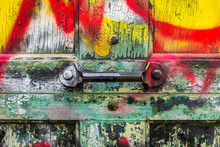 Grungy Graffiti Covered Garage Door With Handle