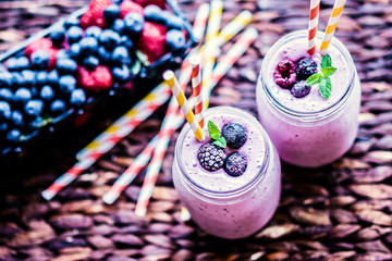 Canvas Print - Fresh berry smoothies on mason jars