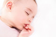 © iuricazac - Close-up portrait of a beautiful sleeping baby on white