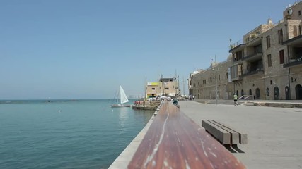 Wall Mural - Fishermen and fishing boats at the old port of Jaffa in Tel Aviv Jaffa, Israel.