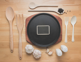 Rural kitchen utensils on wooden table from above - rustic background with free text space,vintage style