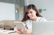 © zhu difeng - Asian beautiful female student study with tablet in classroom