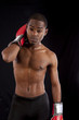 © Allen Penton - Black man with boxing gloves on