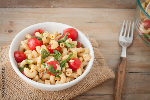 Fotografie, Obraz Italian macaroni salad with tomatoes and fresh basil
