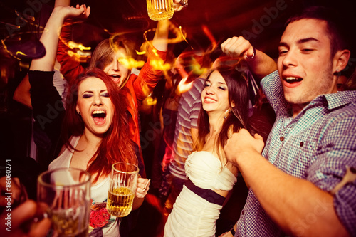 Fotografie, Obraz People in night club. Dancing, drinking and having fun