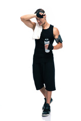 Poster - Tired sports man with towel and bottle with water